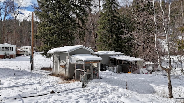 view of yard covered in snow