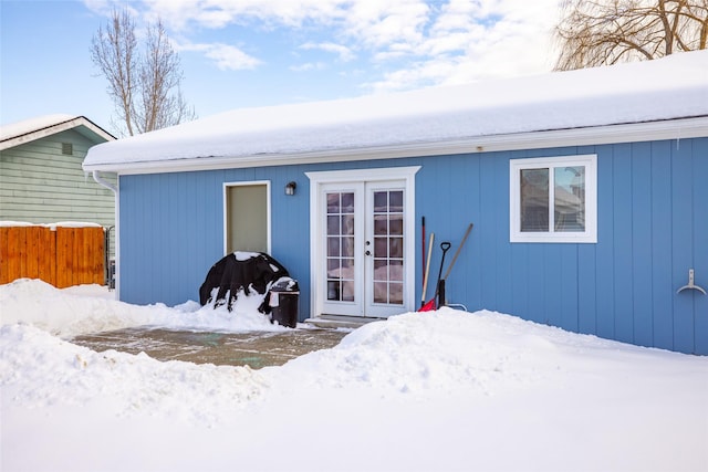 exterior space featuring french doors and fence