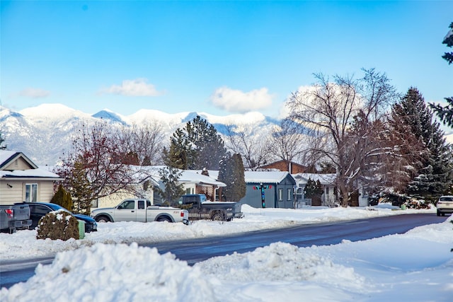 exterior space with a residential view and a mountain view