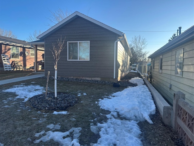 view of snow covered property