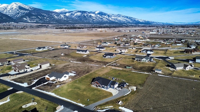 drone / aerial view featuring a mountain view