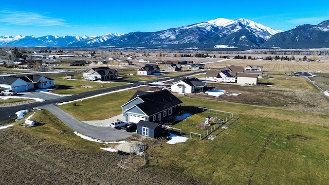 drone / aerial view with a residential view and a mountain view