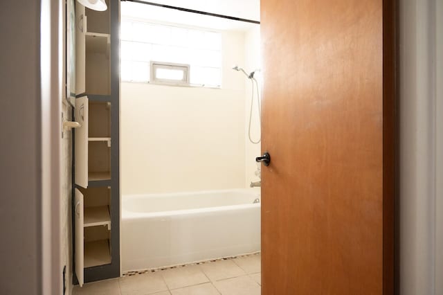 full bath with shower / bath combination and tile patterned flooring