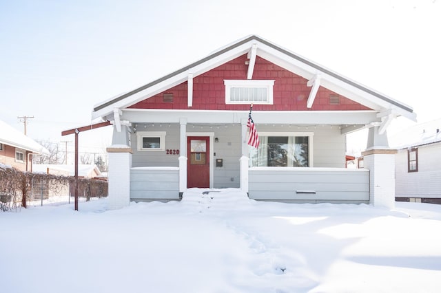 craftsman-style home with covered porch