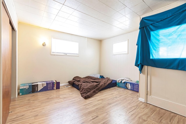 bedroom featuring wood finished floors