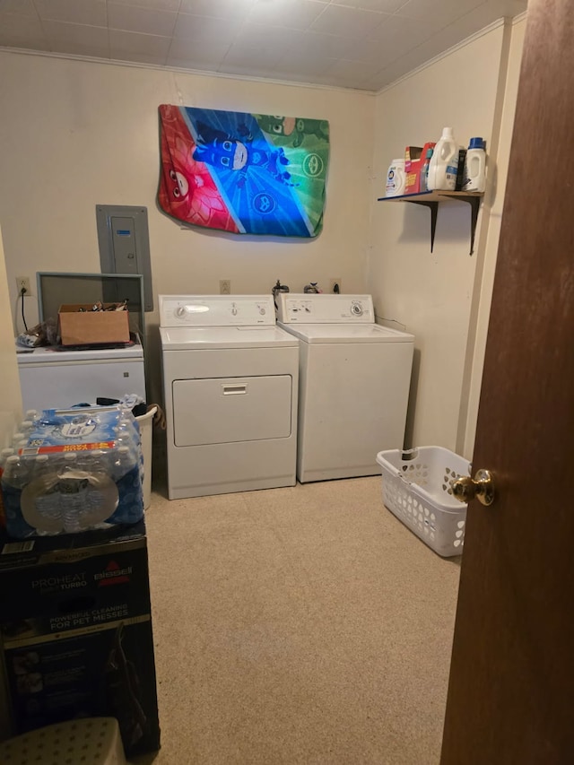 clothes washing area with laundry area and washer and clothes dryer