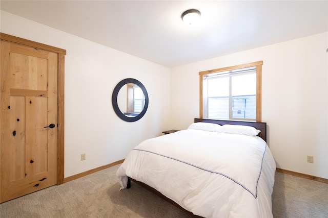 56 Nelson Dr, Rexford, MT 59930 - bedroom with light carpet and baseboards
