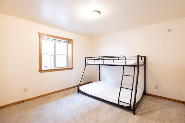 56 Nelson Dr, Rexford, MT 59930 - bedroom featuring light colored carpet and baseboards