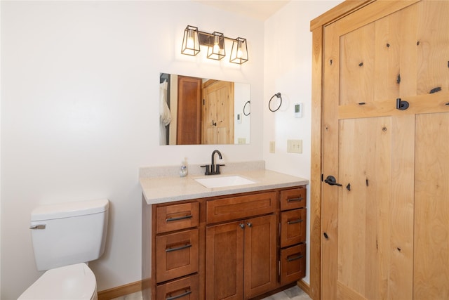 56 Nelson Dr, Rexford, MT 59930 - bathroom with toilet, a closet, and vanity
