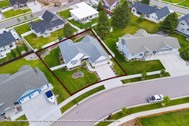 drone / aerial view with a residential view