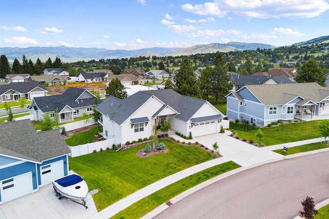 aerial view with a mountain view and a residential view