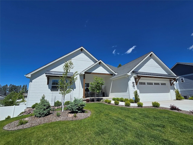 ranch-style home featuring a garage, concrete driveway, a front lawn, and fence