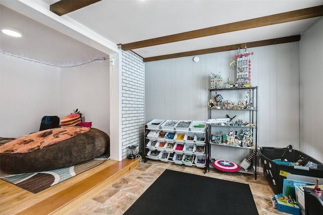 bedroom featuring beamed ceiling