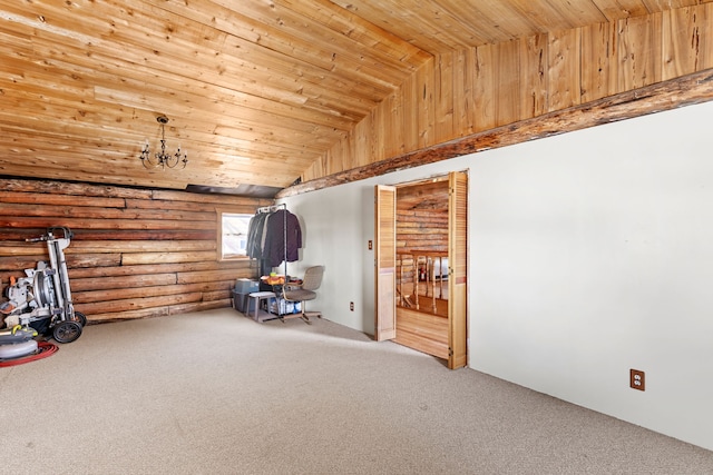 spare room with carpet floors, a notable chandelier, rustic walls, vaulted ceiling, and wooden ceiling