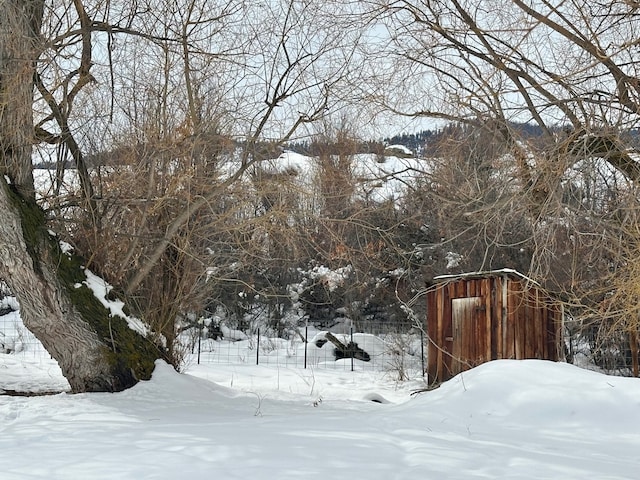 view of snowy yard