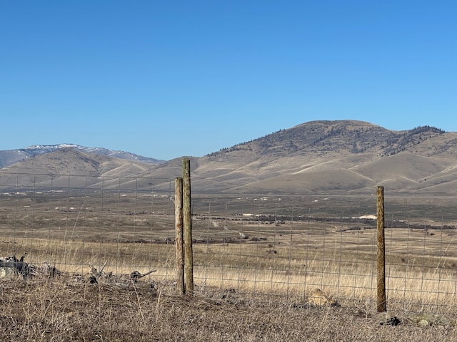 view of mountain feature with a rural view