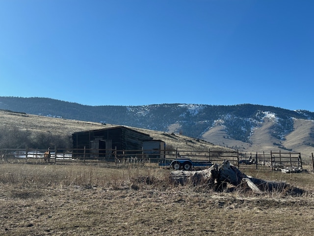 mountain view featuring a rural view