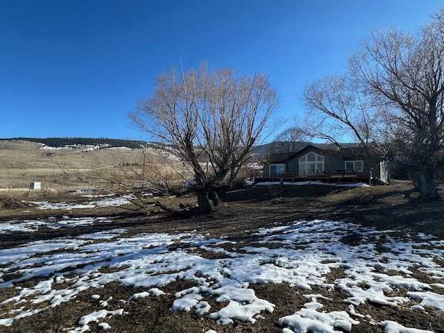 view of snow covered property