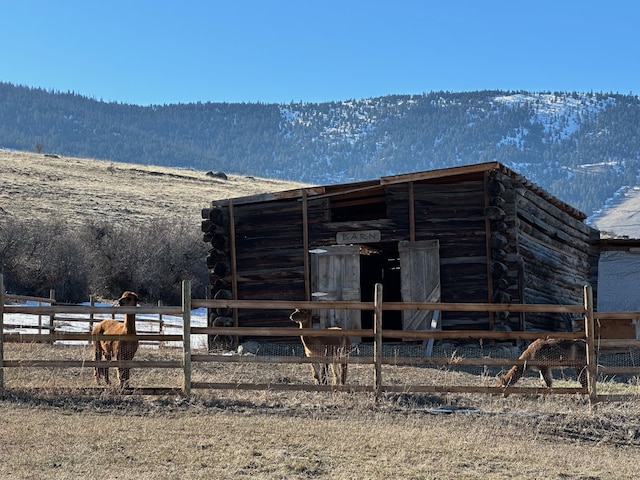 view of outbuilding featuring an exterior structure and an outdoor structure