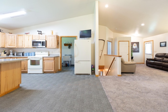 kitchen with light carpet, white appliances, open floor plan, light countertops, and light brown cabinets