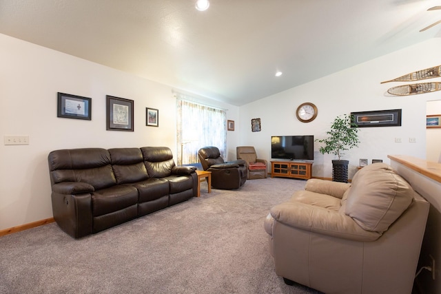 carpeted living area featuring baseboards, vaulted ceiling, and recessed lighting