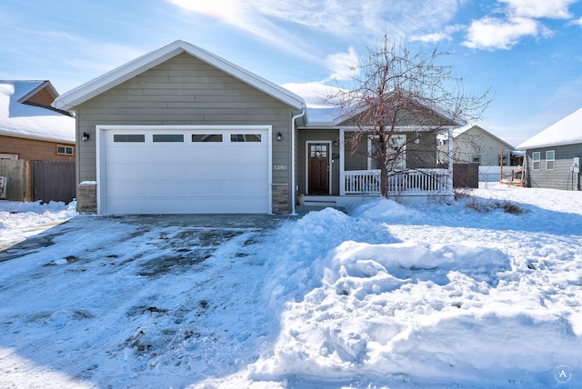 view of front of home with a garage and covered porch