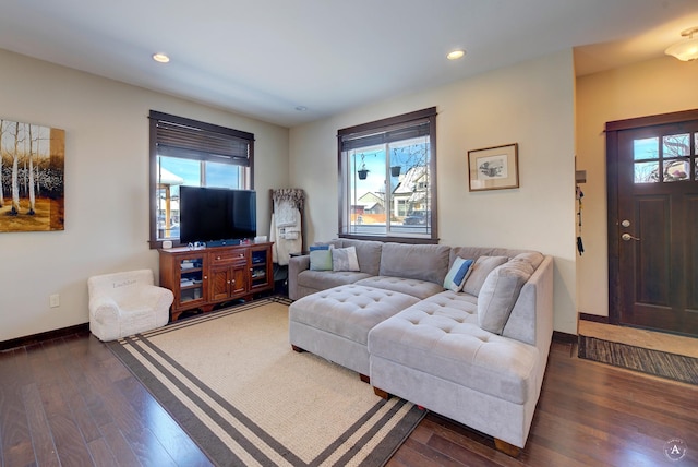 living area with recessed lighting, dark wood finished floors, and baseboards