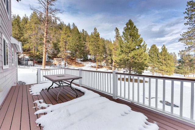 view of snow covered deck