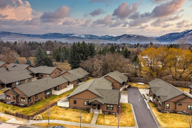 drone / aerial view with a residential view and a mountain view