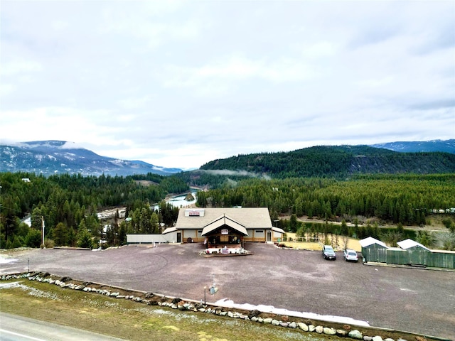 mountain view featuring a view of trees