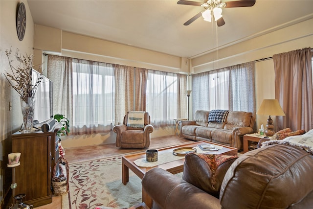 living room with a ceiling fan