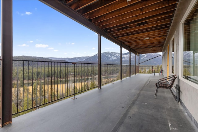 view of patio / terrace featuring a mountain view