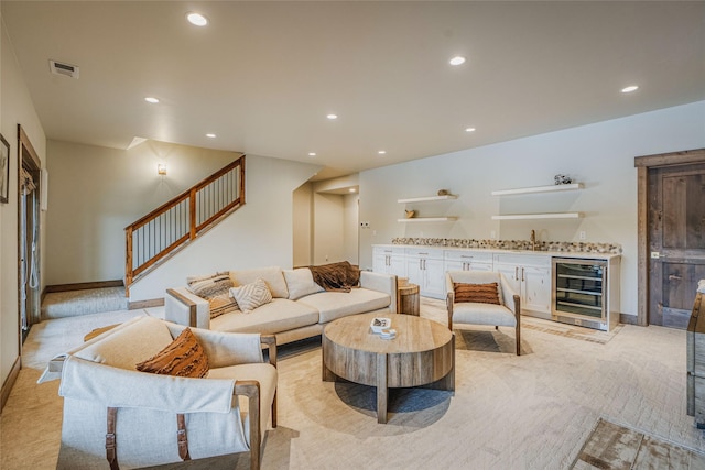 30 Ninebark Way, Eureka, MT 59917 - living area featuring stairs, wine cooler, wet bar, visible vents, and recessed lighting