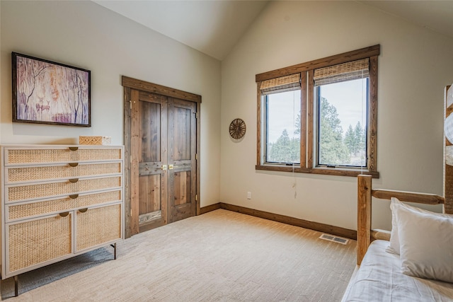 30 Ninebark Way, Eureka, MT 59917 - bedroom featuring carpet, vaulted ceiling, and baseboards