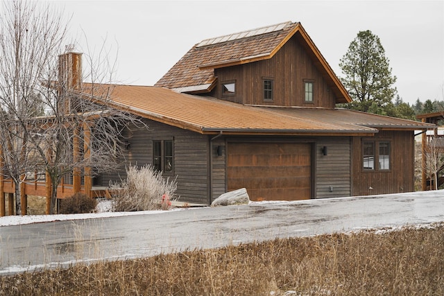30 Ninebark Way, Eureka, MT 59917 - view of property exterior with a chimney