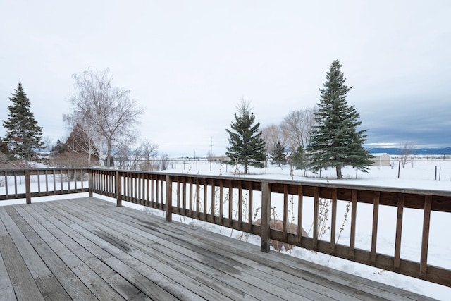 view of snow covered deck