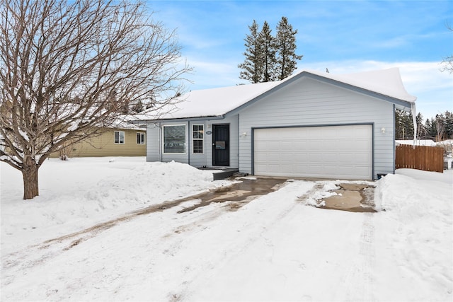 view of front of home with a garage