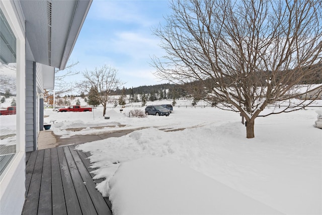 view of yard covered in snow