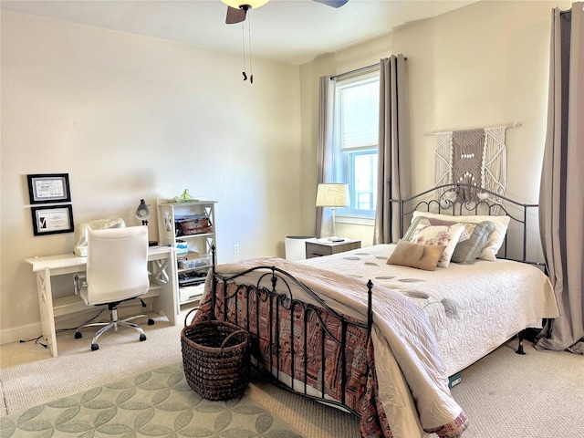 bedroom featuring carpet, baseboards, and ceiling fan