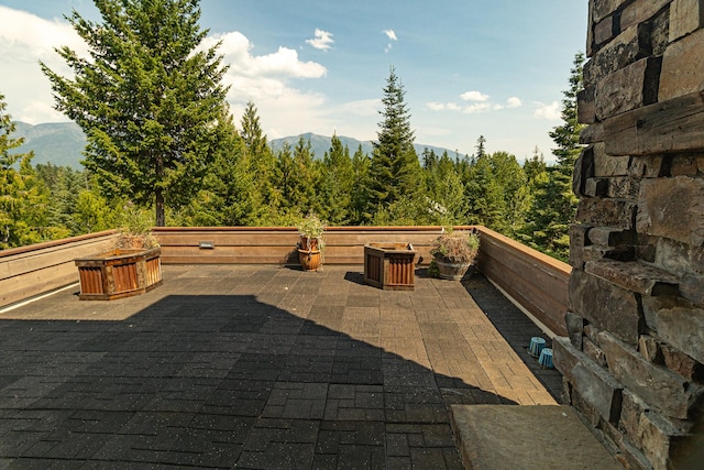 view of patio / terrace featuring a mountain view