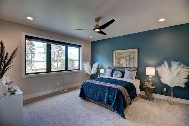 bedroom with carpet, baseboards, and recessed lighting