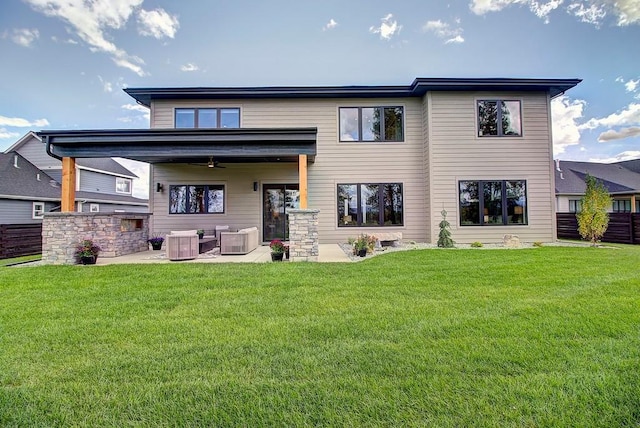 back of property featuring ceiling fan, a patio, a yard, and cooling unit