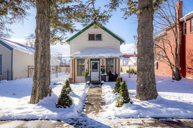 view of front of house with fence