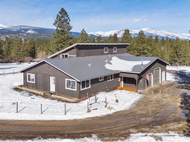 exterior space featuring a mountain view