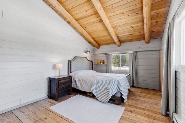 bedroom with vaulted ceiling with beams, wooden ceiling, wooden walls, a baseboard heating unit, and light wood-style floors