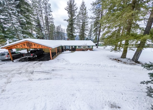 exterior space with a carport