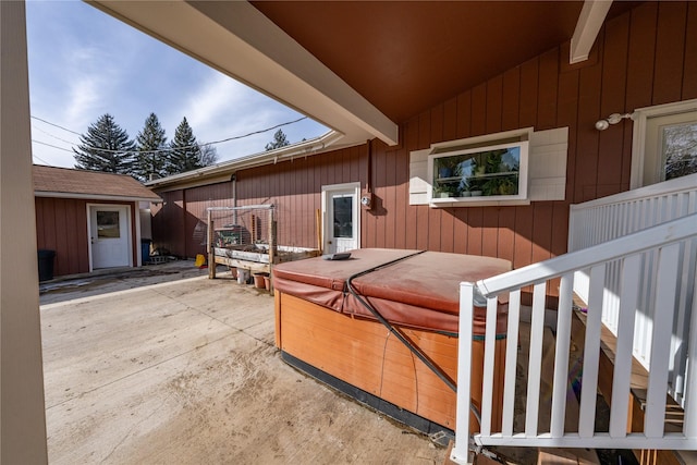 view of patio / terrace featuring a hot tub