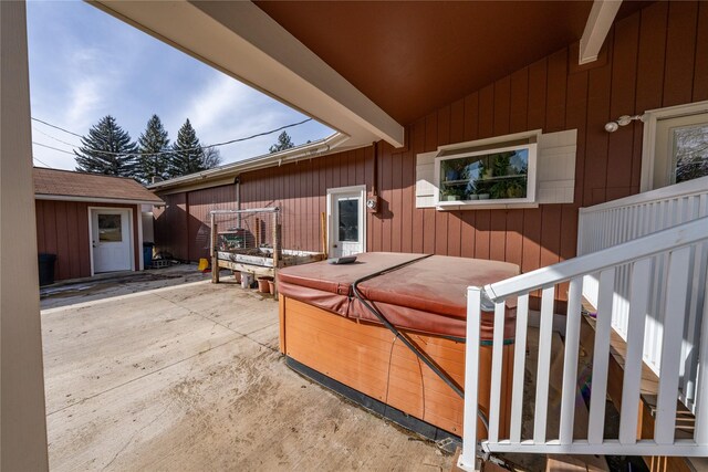 647 Northwood Ave, Libby, MT 59923 - view of patio with a hot tub