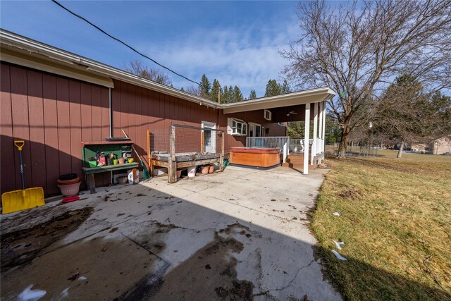 647 Northwood Ave, Libby, MT 59923 - view of patio / terrace featuring a hot tub