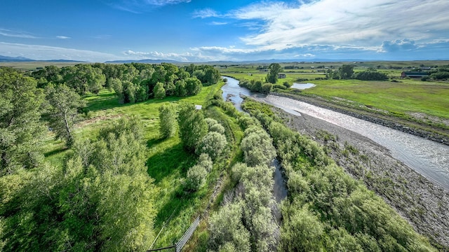 bird's eye view with a water view and a rural view